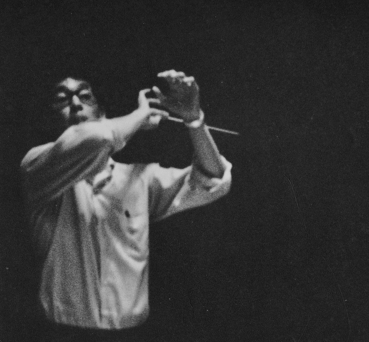 Dennis Kam conducting