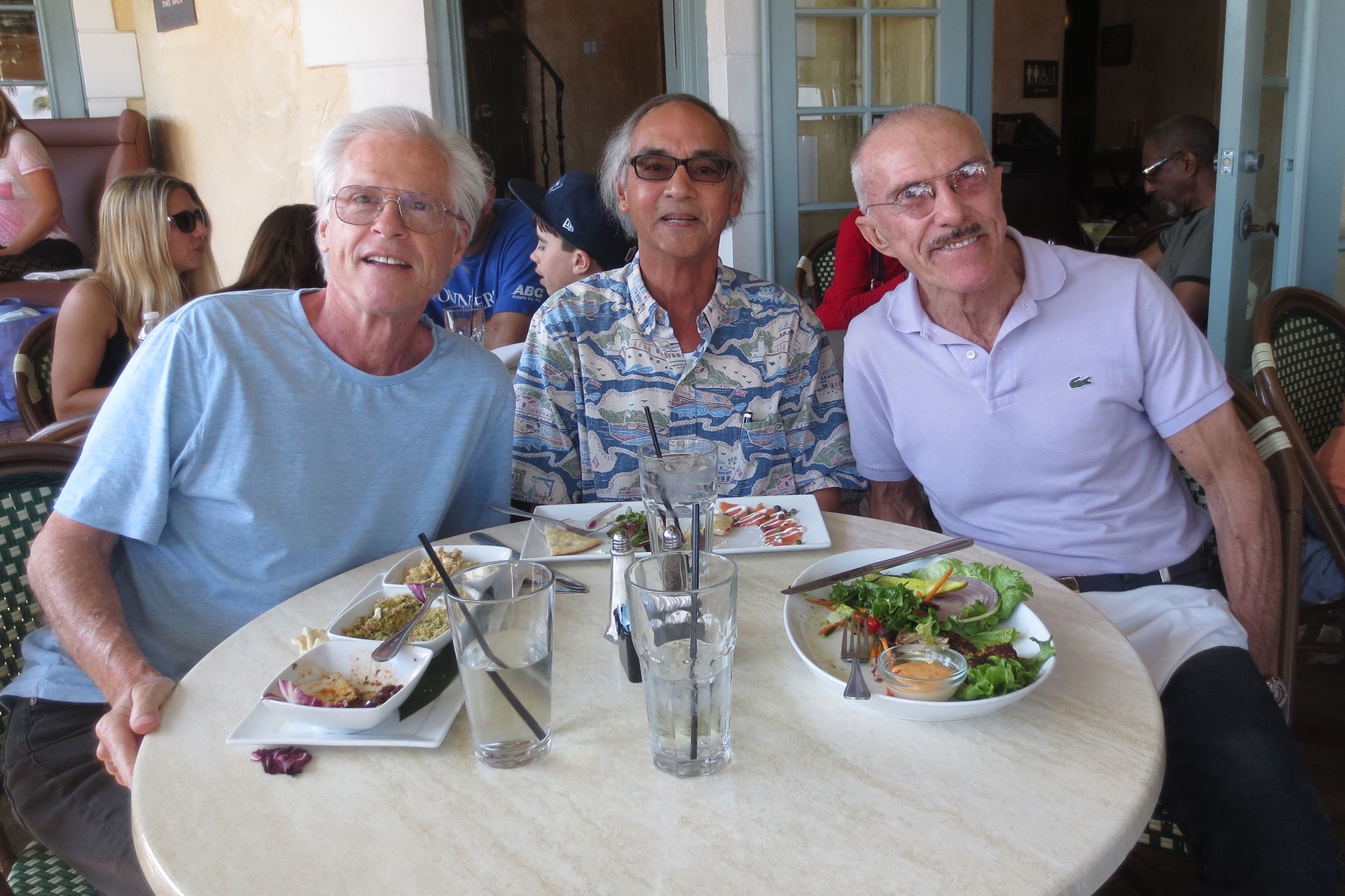 People in the image, from left to right: John Van der Slice, Dennis Kam, and Jim Ostryne (Fort Lauderdale, 2015)